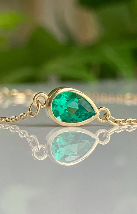 pear shaped emerald chain link yellow gold bracelet.jpeg - Suzanne Crudden Custom Jewellery